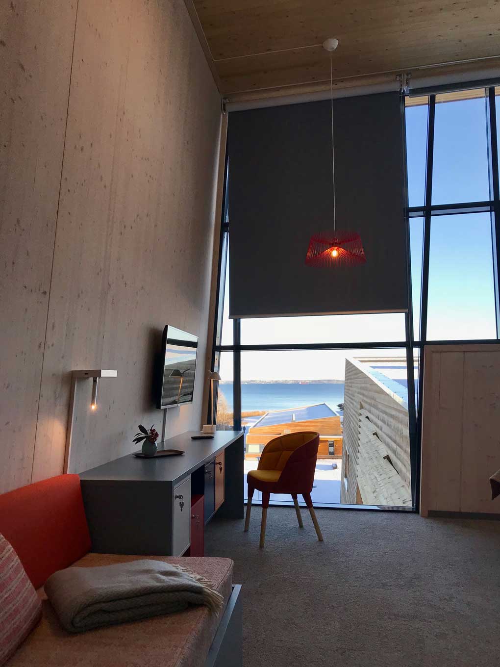 Hotel room, desk and chair, window with a view