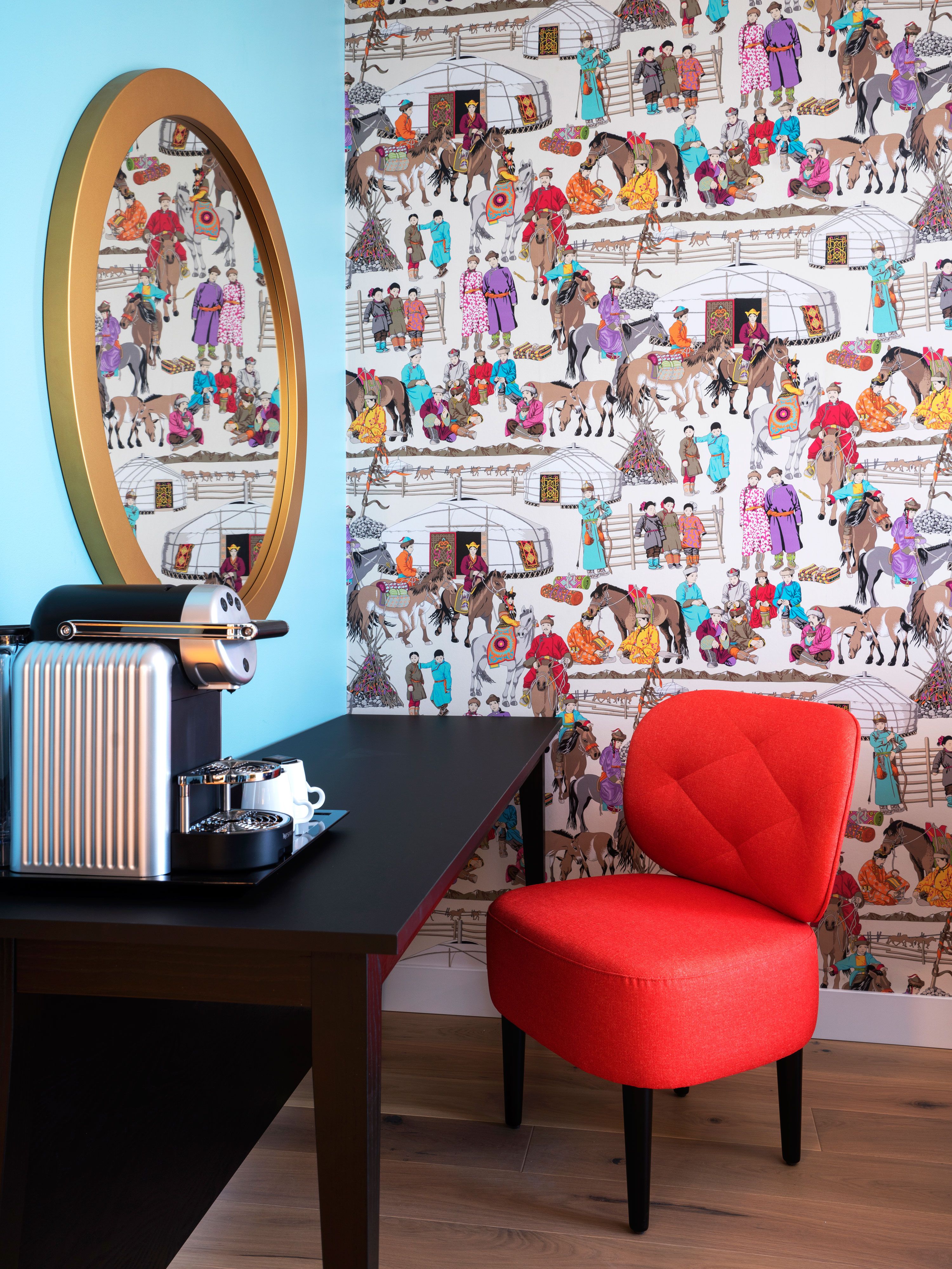 Detail of suite with nespresso machine and red chair. Thon Hotel Storo, Oslo. Photo