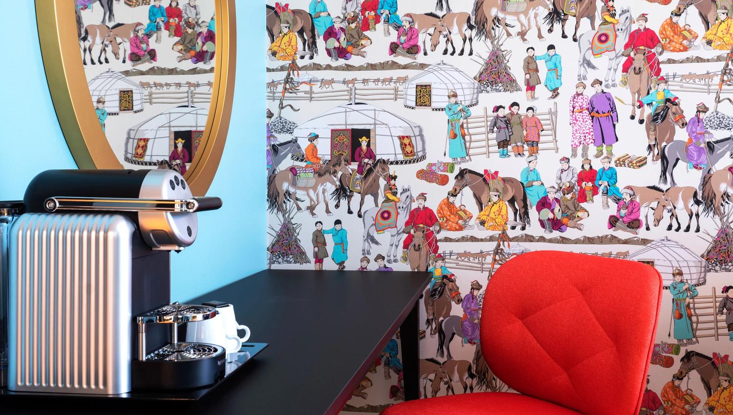 Detail of suite with nespresso machine and red chair. Thon Hotel Storo, Oslo. Photo