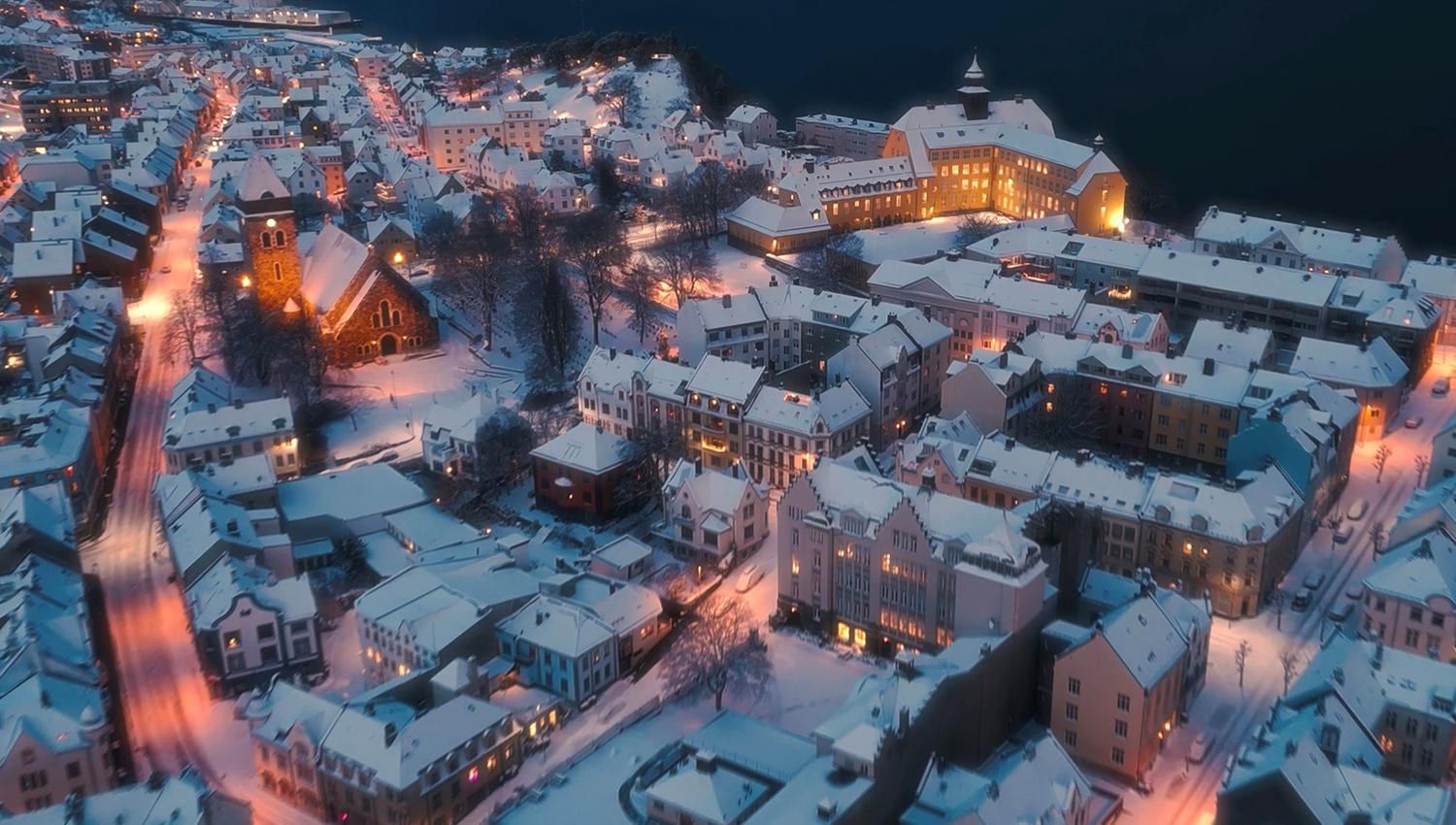 Enchanting snowy evening in Ålesund. Scene from the movie