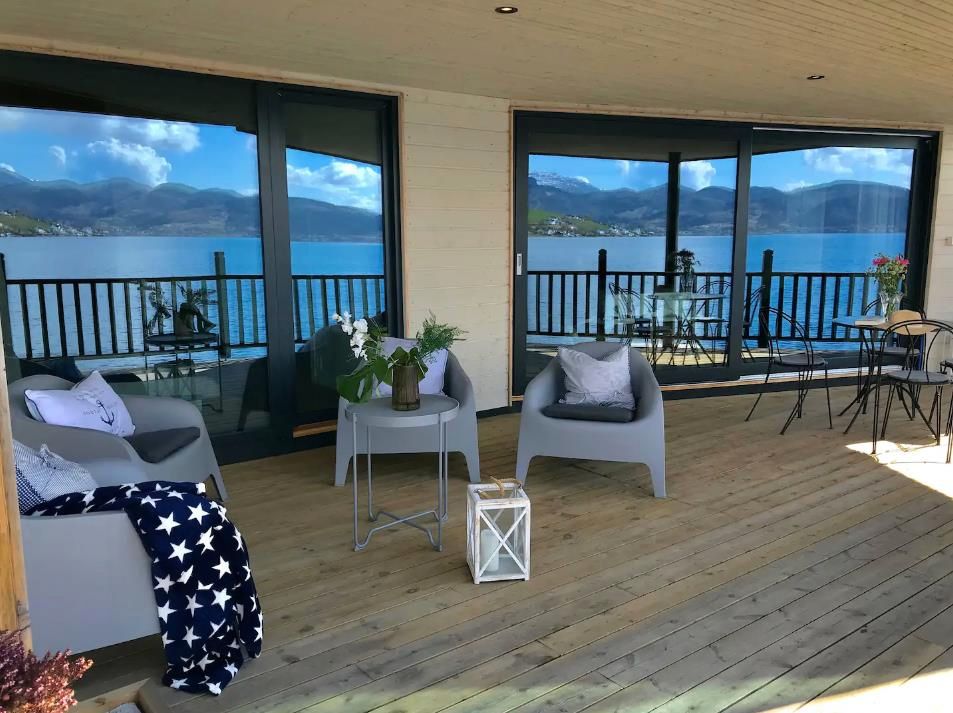A beautiful terrace with comfortable seating and stunning views of the Hardangerfjord.