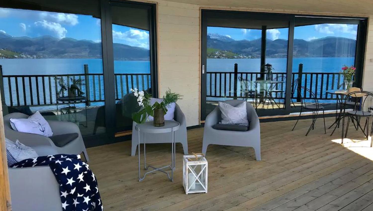A beautiful terrace with comfortable seating and stunning views of the Hardangerfjord.