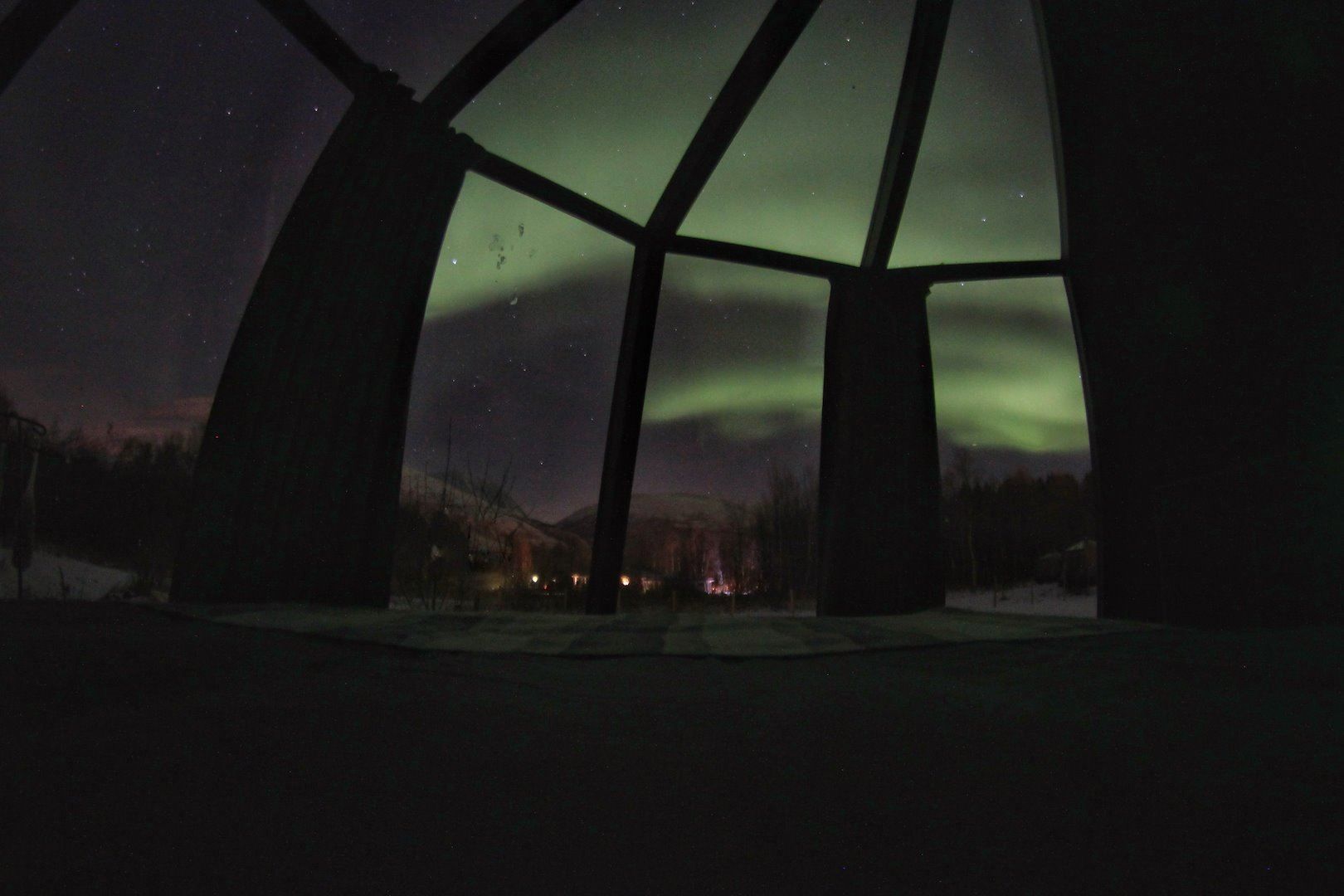 Northern lights from glass iglo at North Experience