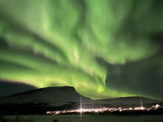 The Northern Lights cover the sky in a brilliant display of colours