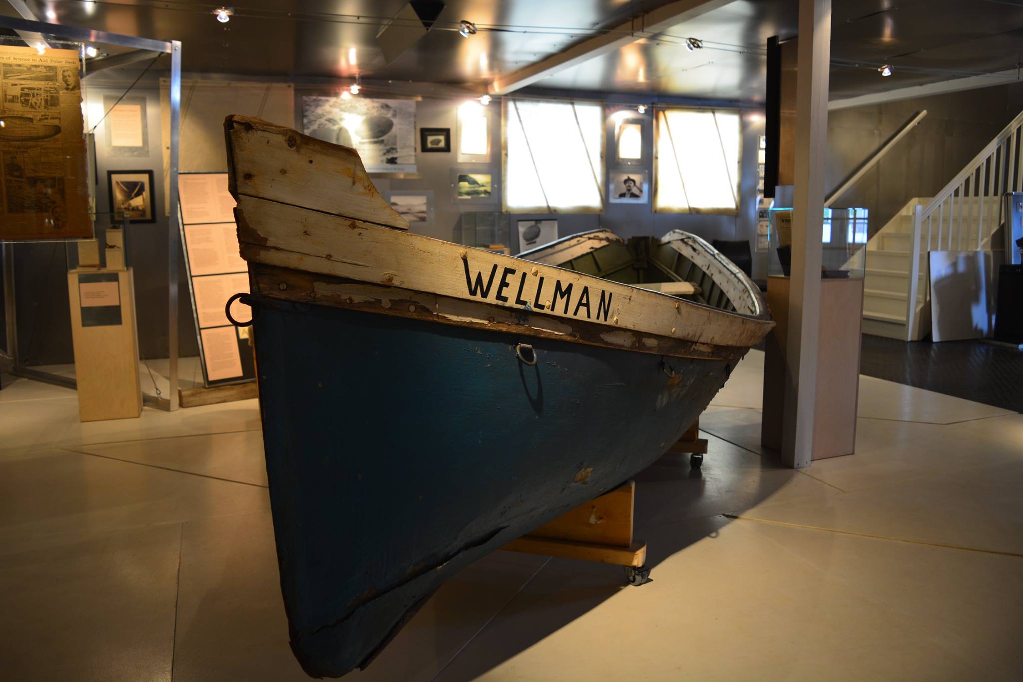 A boat that is part of the exhibition inside the museum