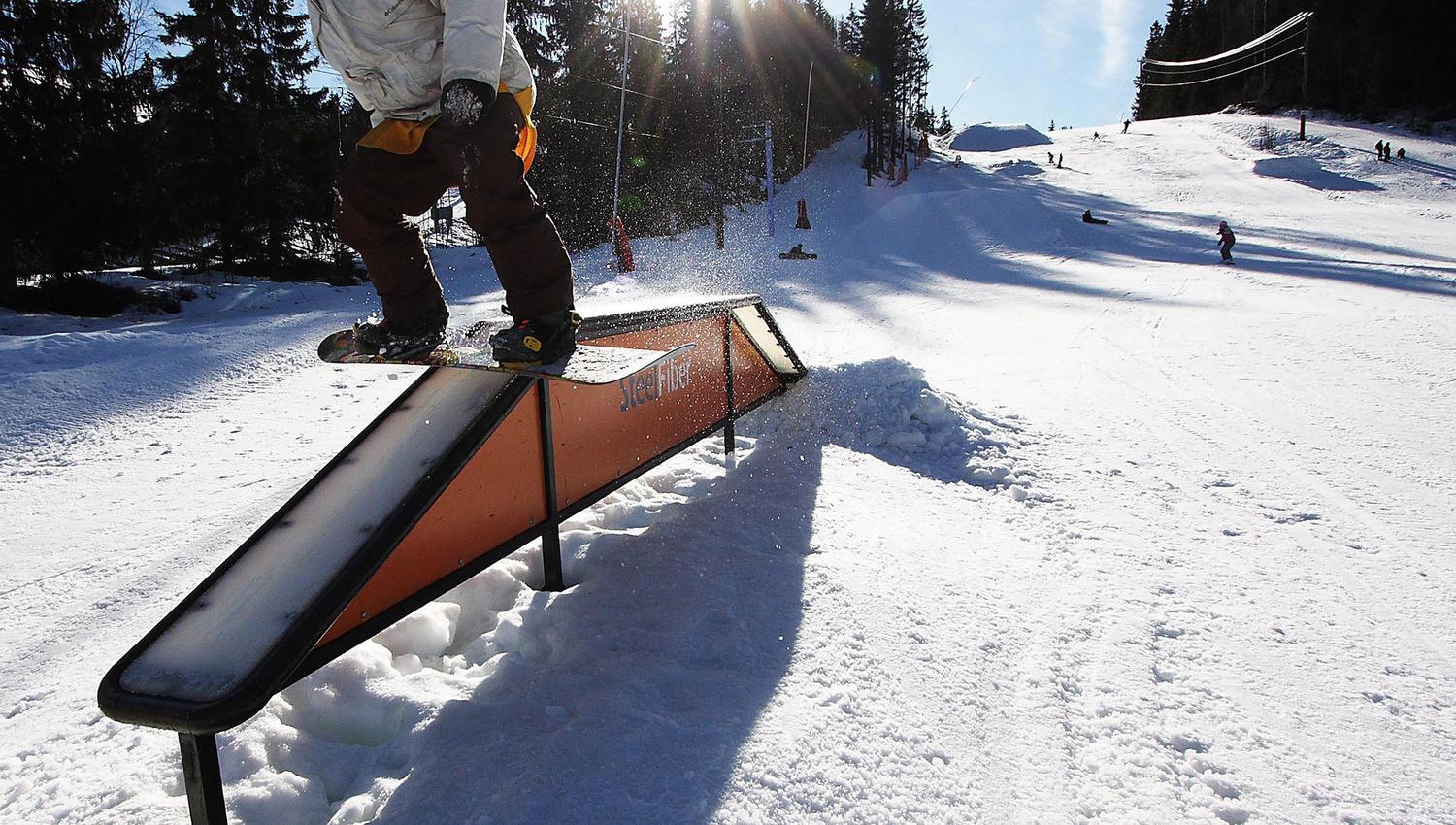 a person on a snowboard doing tricks