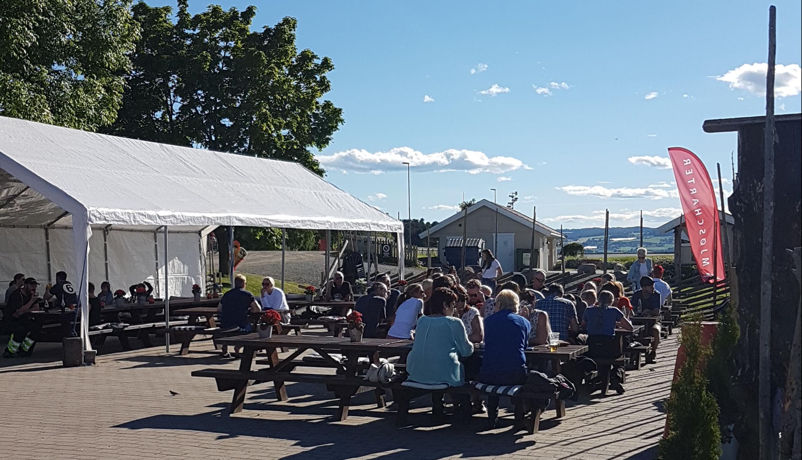 Øya Maritim på Helgøya - Solskinnsdag