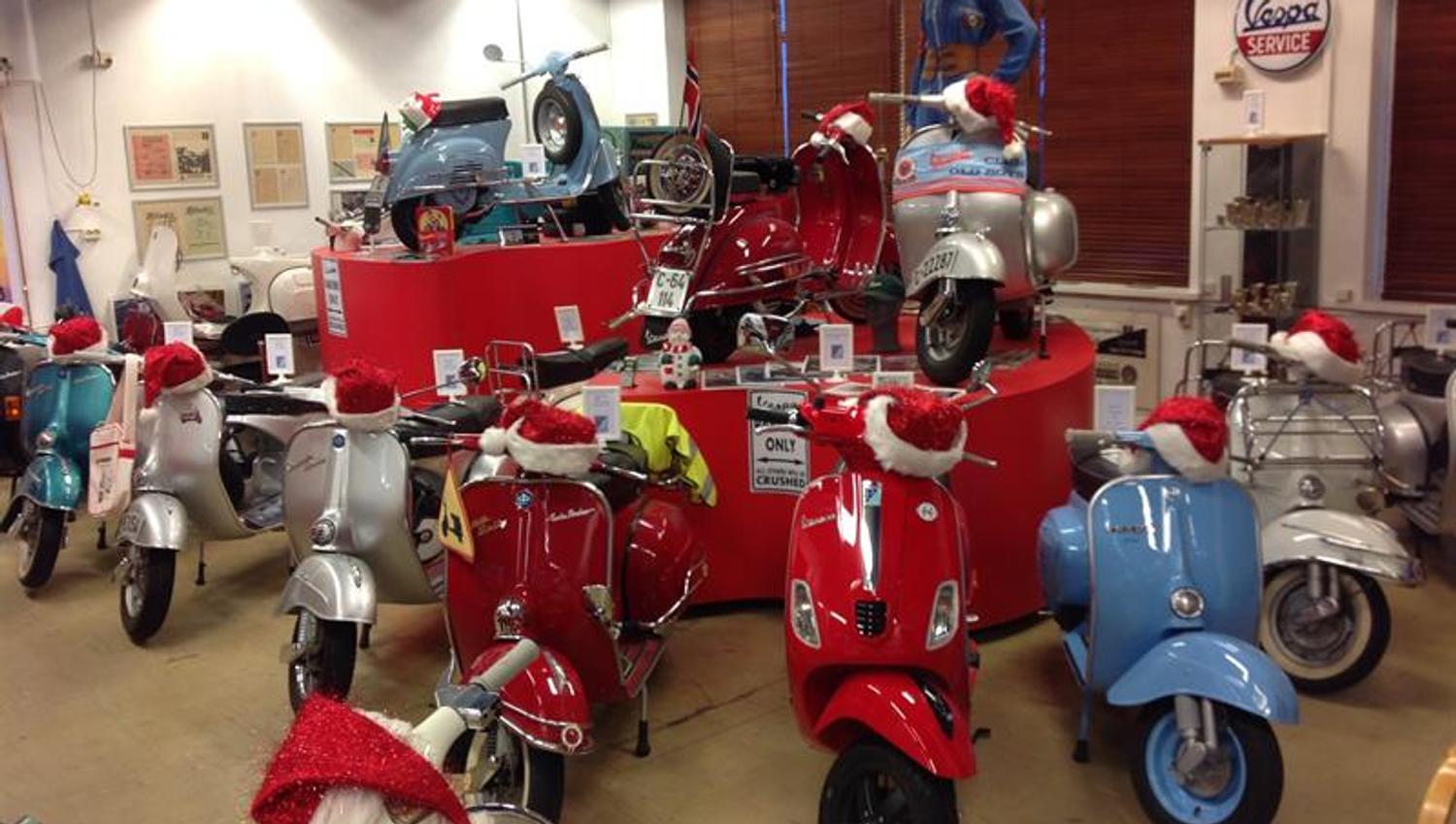 Red and colorful Vespa motor bikes