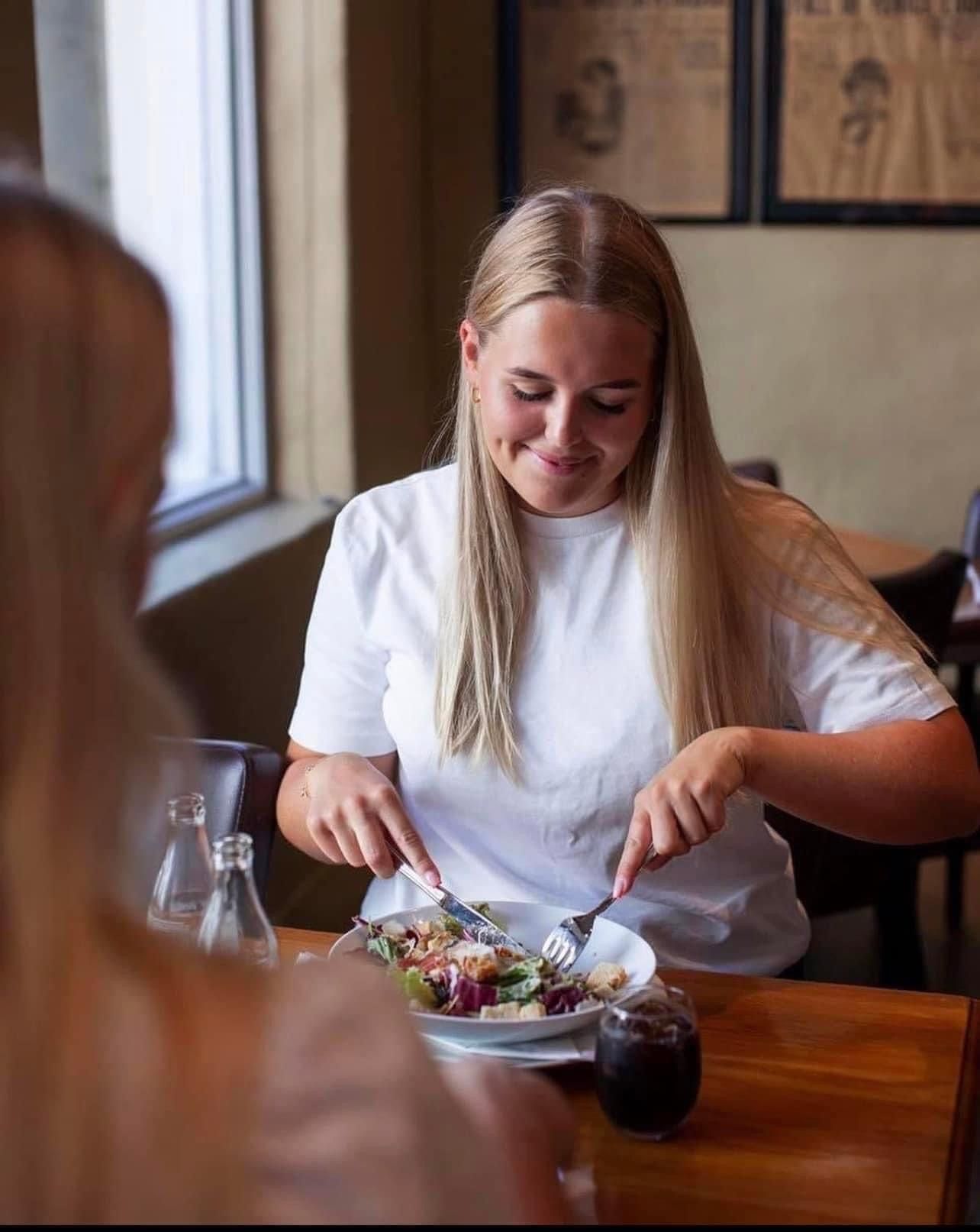 Guest enjoying a delicious salad.
