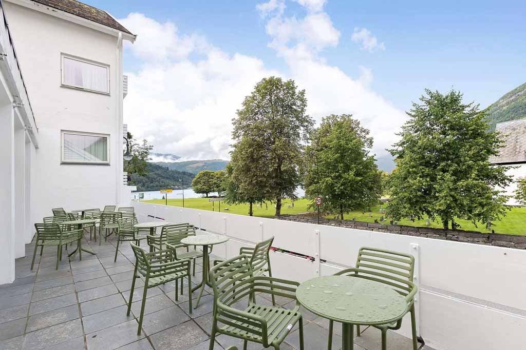 Seating with stunning views of the fjord and mountains.