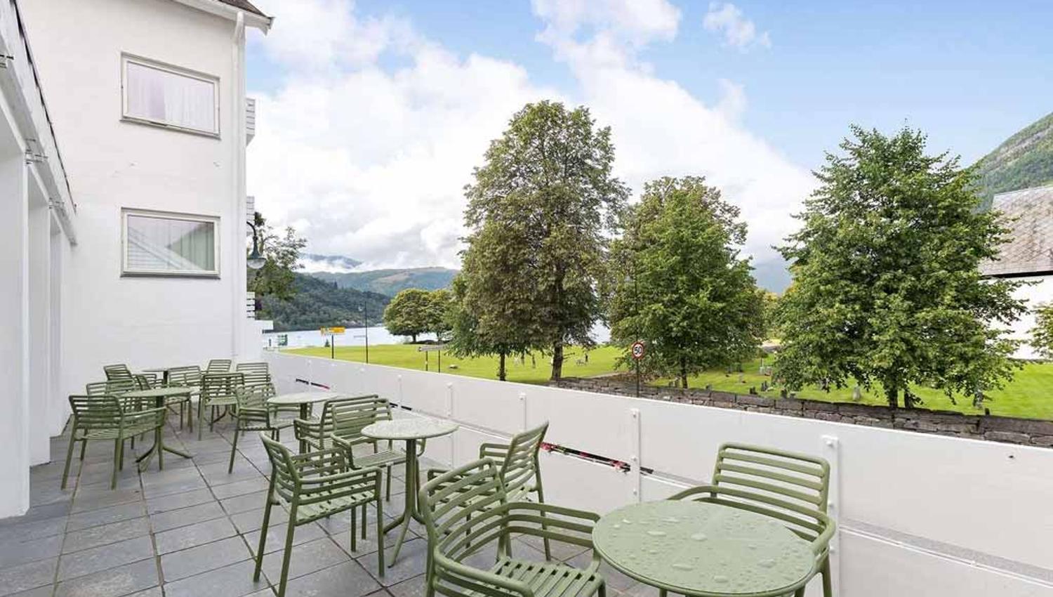 Seating with stunning views of the fjord and mountains.