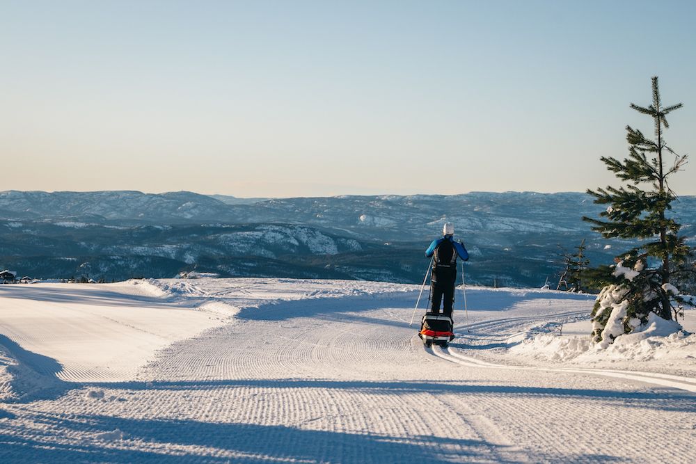 man with sledge on cross-country ski on Lifjell 