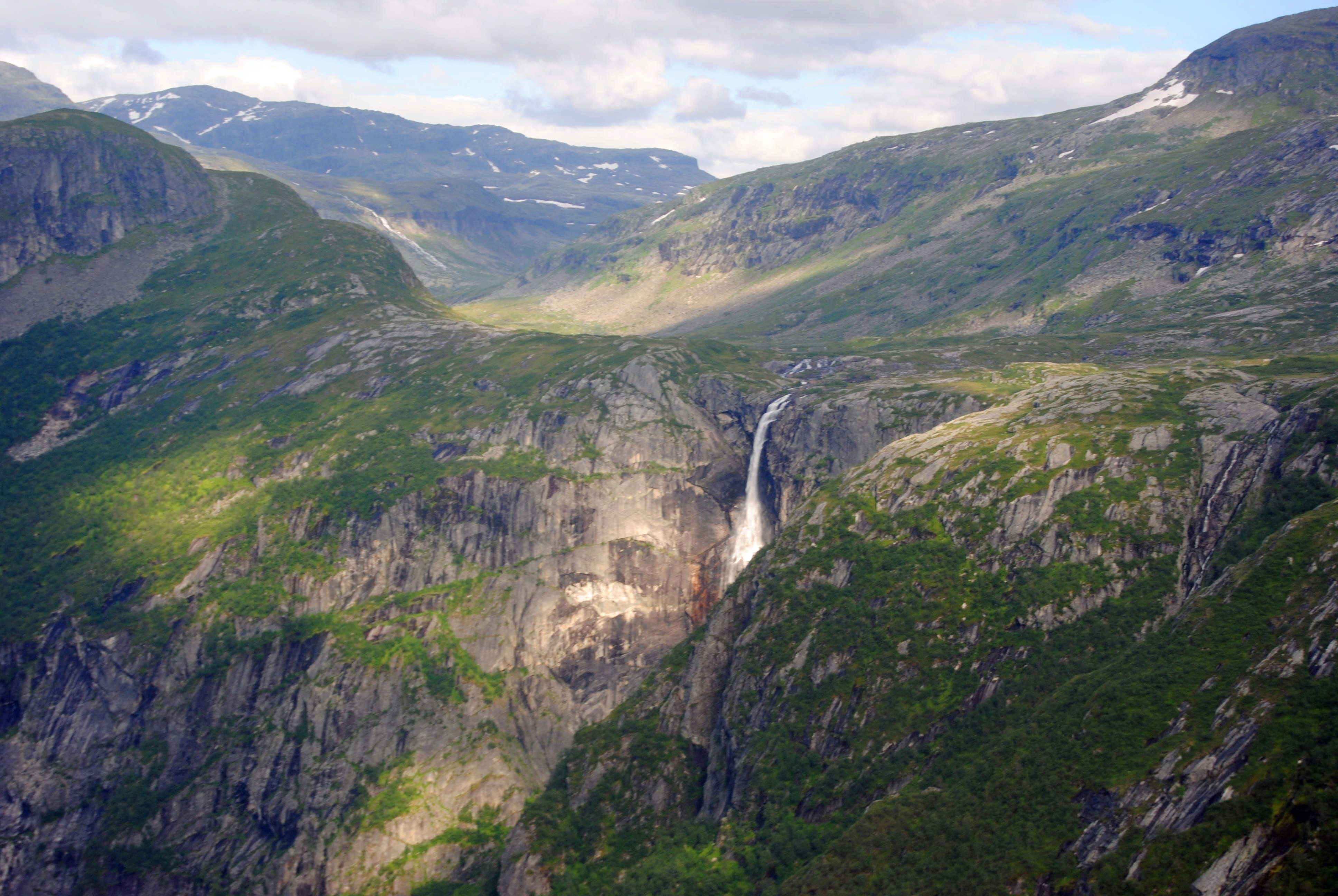 Skytjefossen waterfall seen from a helicopter.