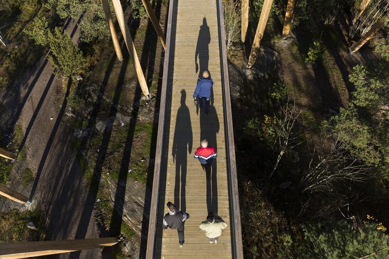 people walking on the tower from a bird's eye view