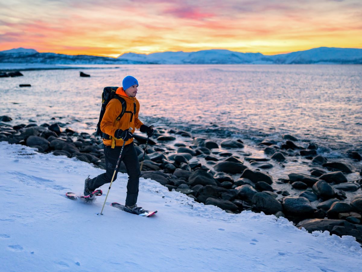 One person walking with snowshoes.