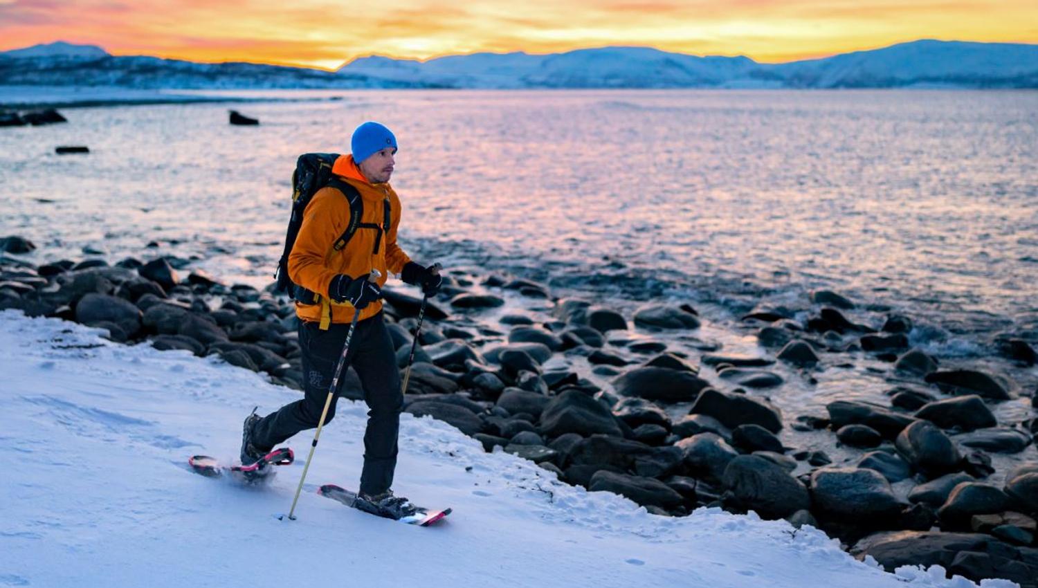 One person walking with snowshoes.