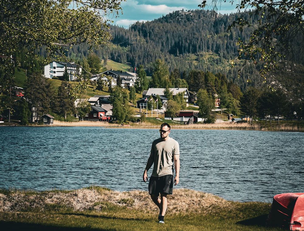 man by lake Morgedalsvannet at Morgedal Camping & Lavvo Glamping