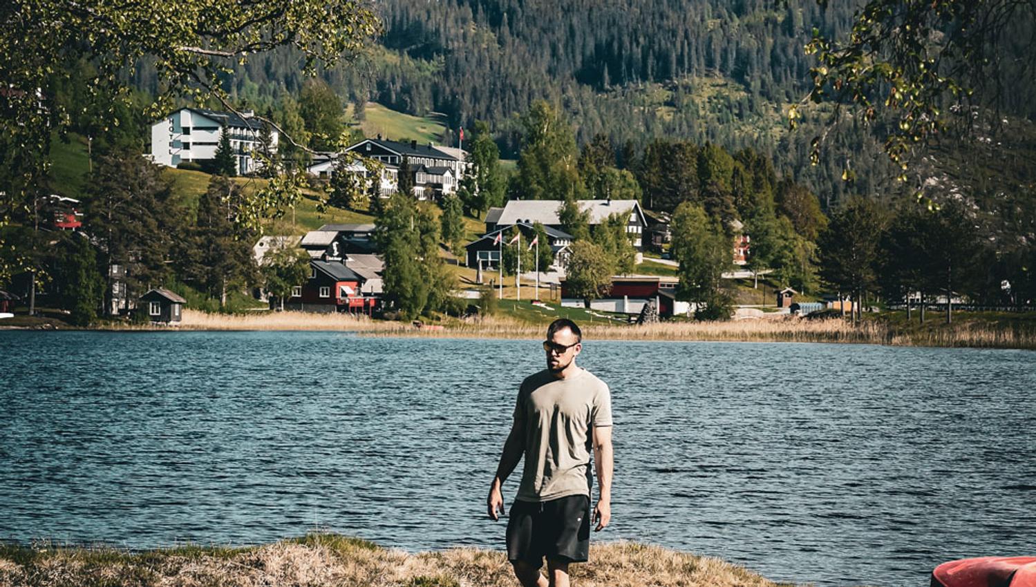 man by lake Morgedalsvannet at Morgedal Camping & Lavvo Glamping