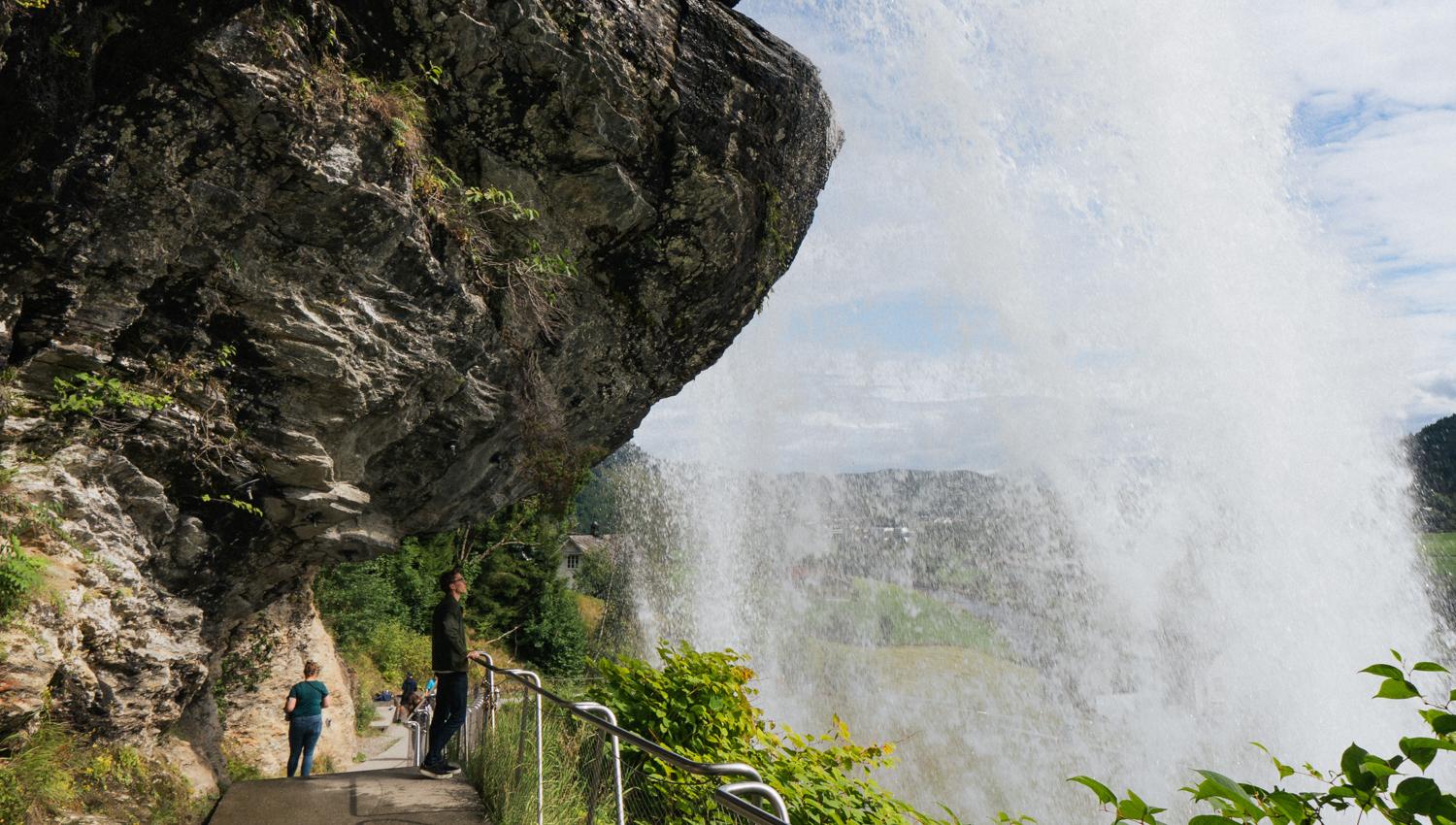 Path leading behind Steinsdalsfossen – a magical nature experience.