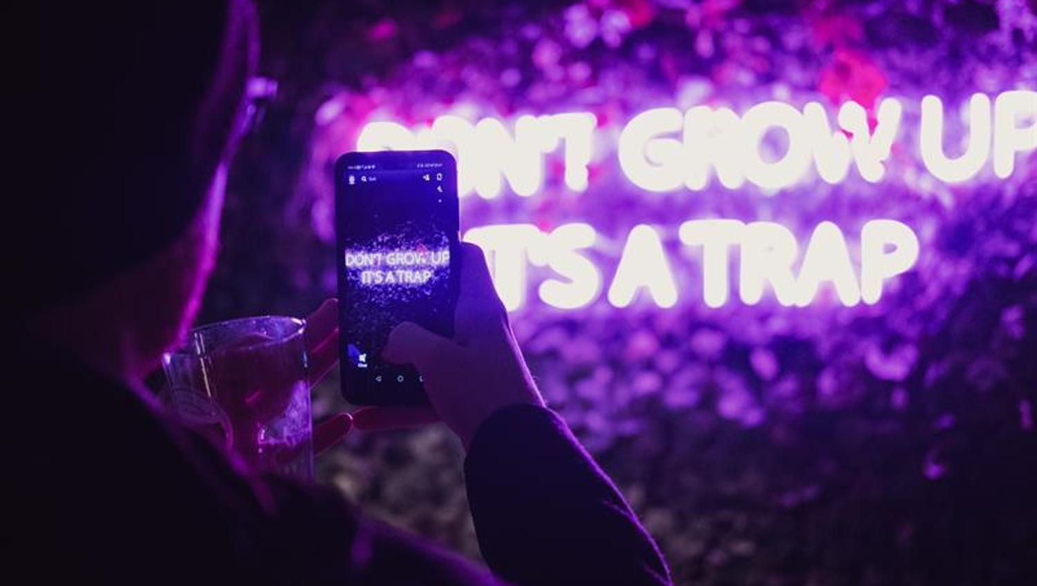 Sign: "Don't Grow up - It's a Trap"