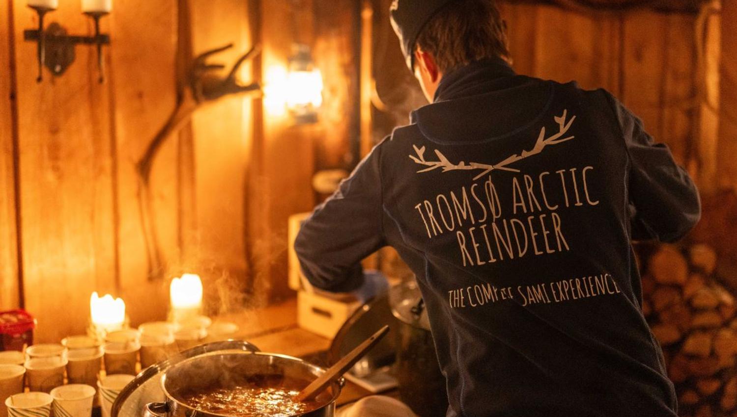 Preparing bidos. Traditional reindeer stew