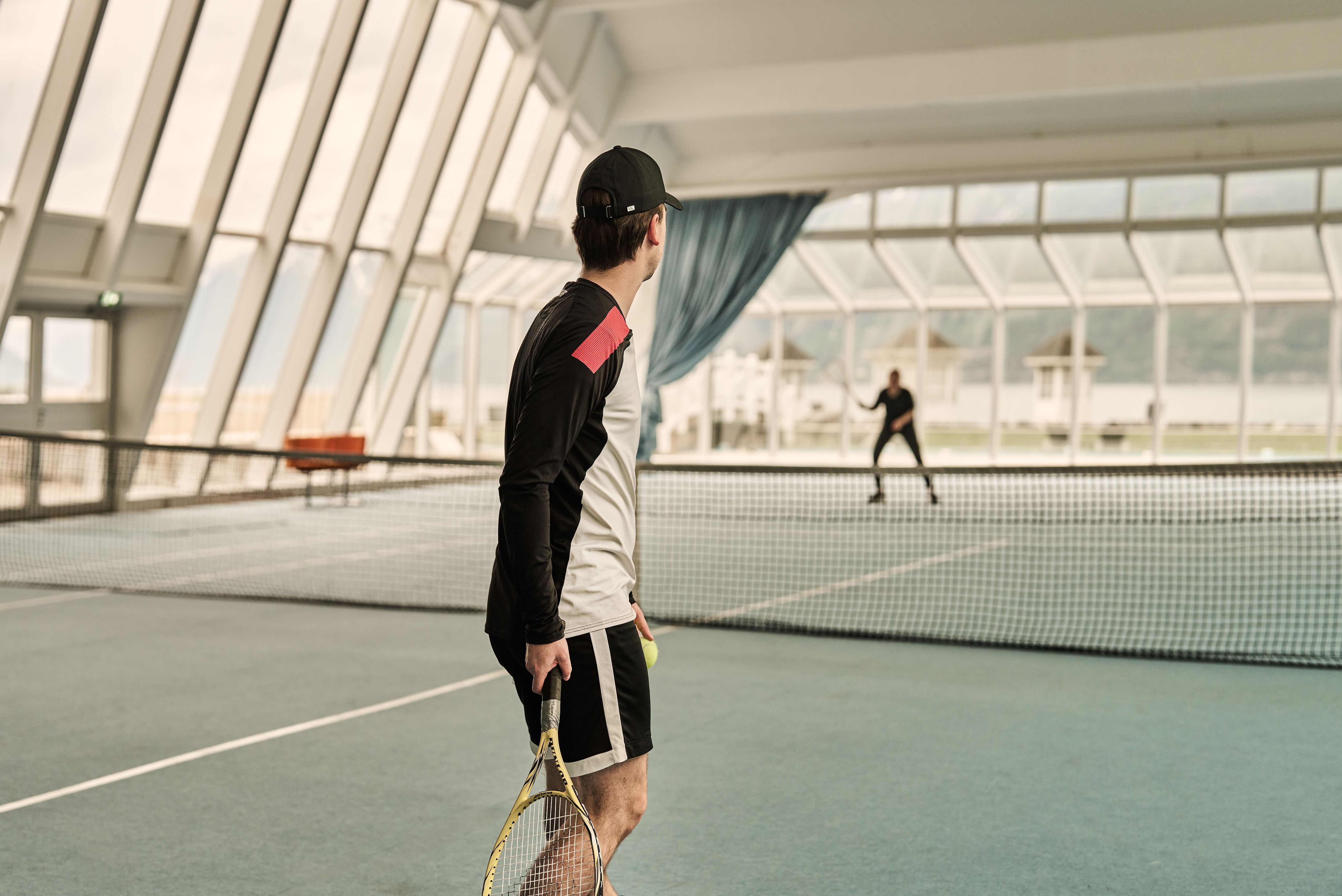 Indoor tennis court with fjord view at Hotel Ullensvang.