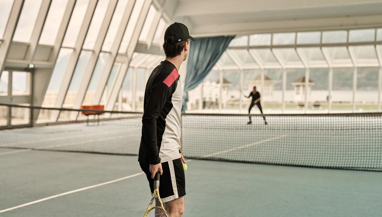 Indoor tennis court with fjord view at Hotel Ullensvang.