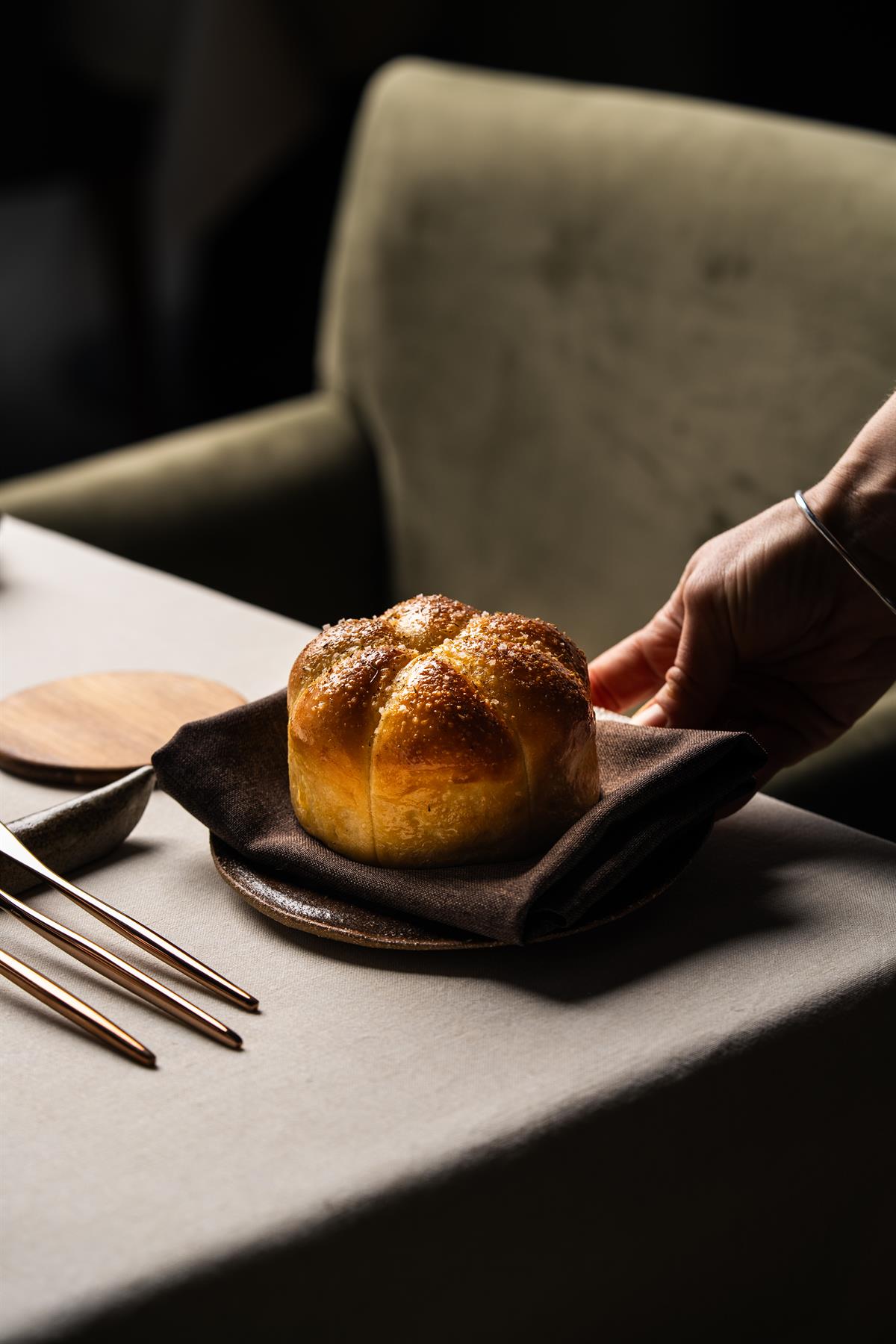 Freshly baked bread served on a plate.