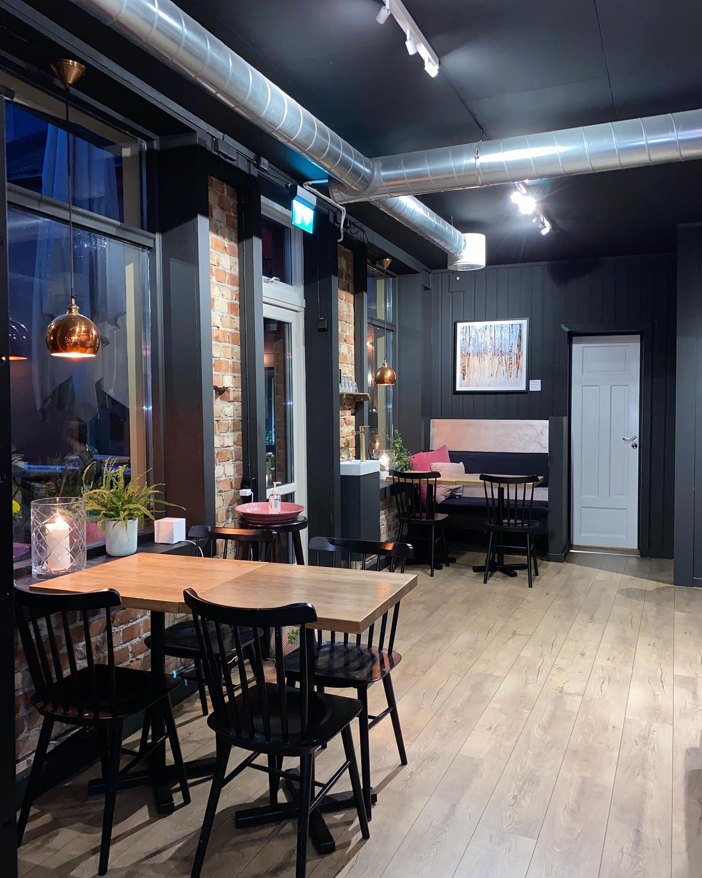 Inside Bare Barista. Chairs and tables.