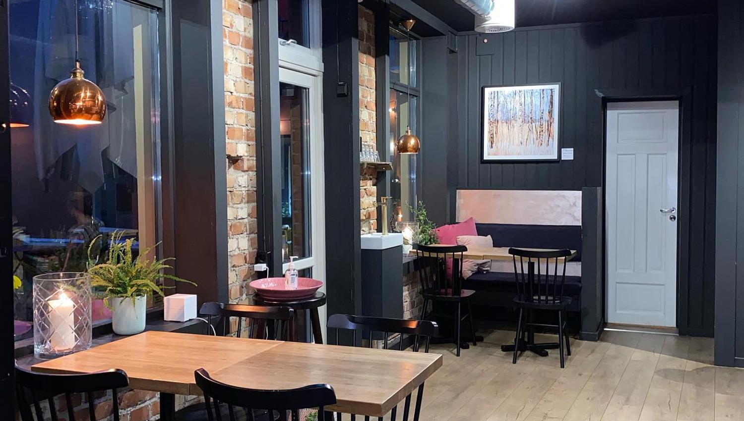 Inside Bare Barista. Chairs and tables.