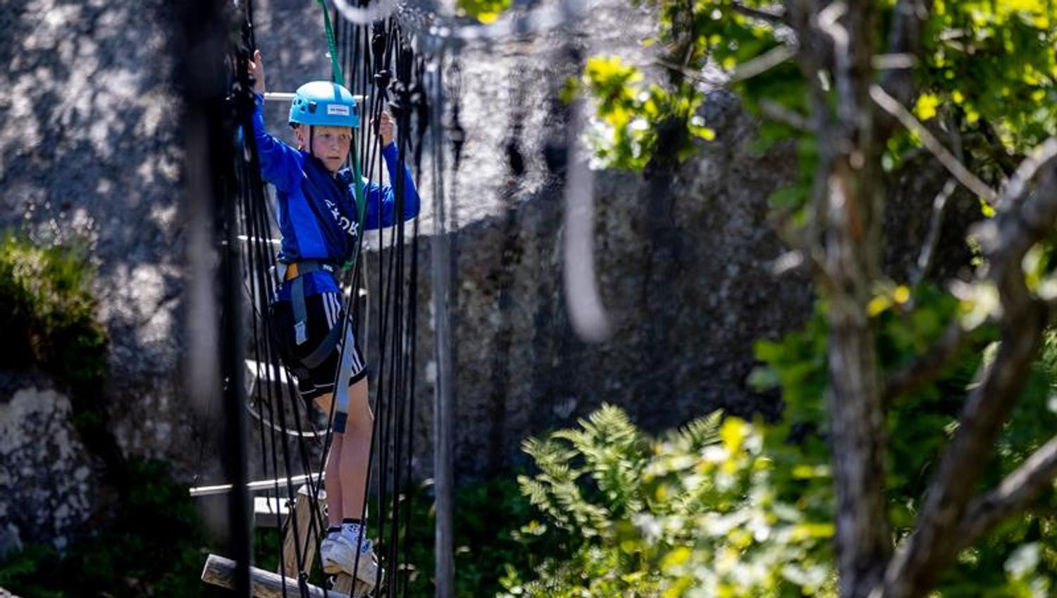 Child in the climbing route