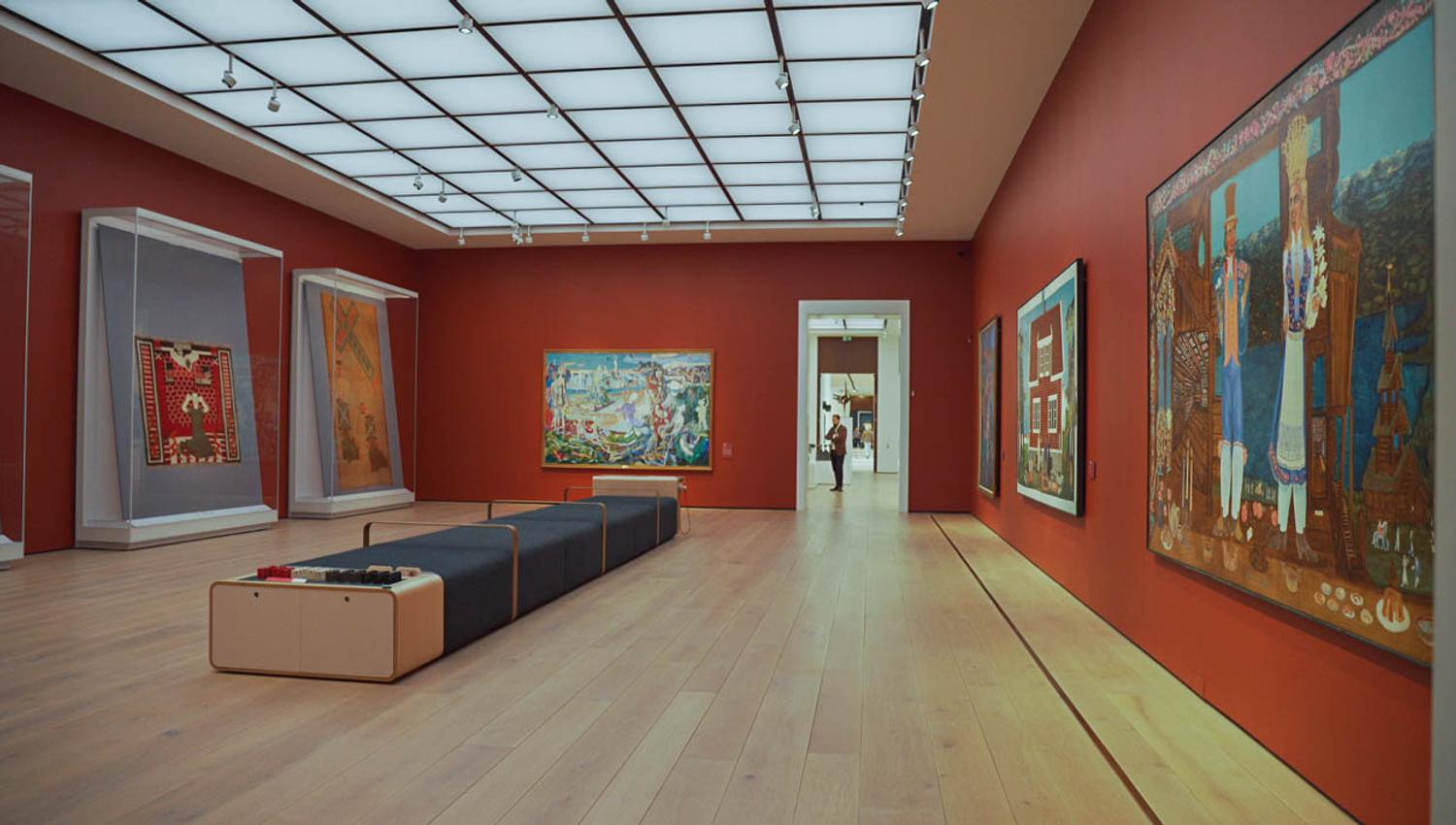 Large paintings in an exhibition.
