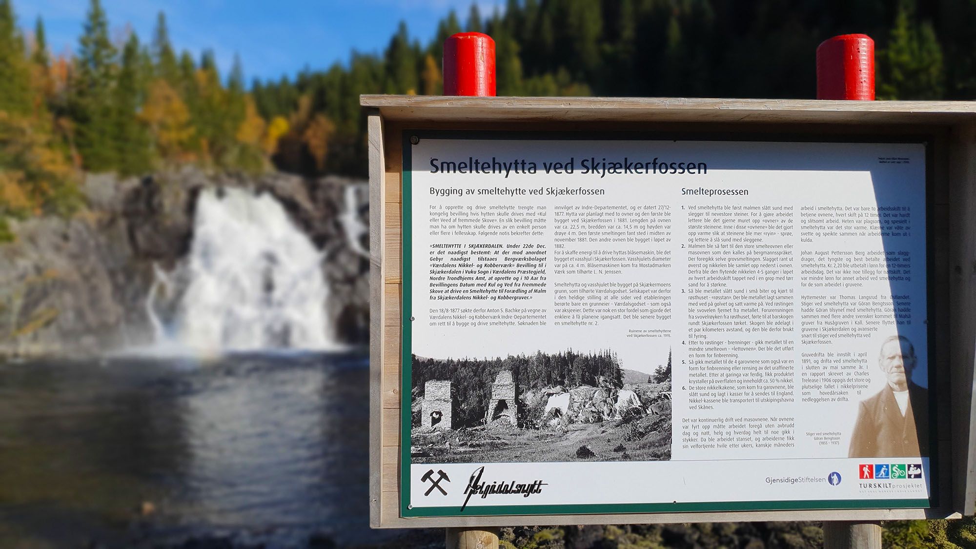 Information board about the Smelting hut by the waterfall