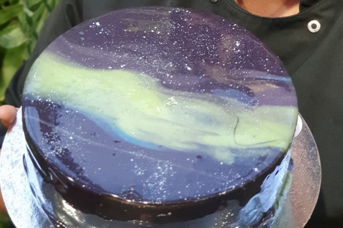 Bilde av en kake med nordlysmotiv