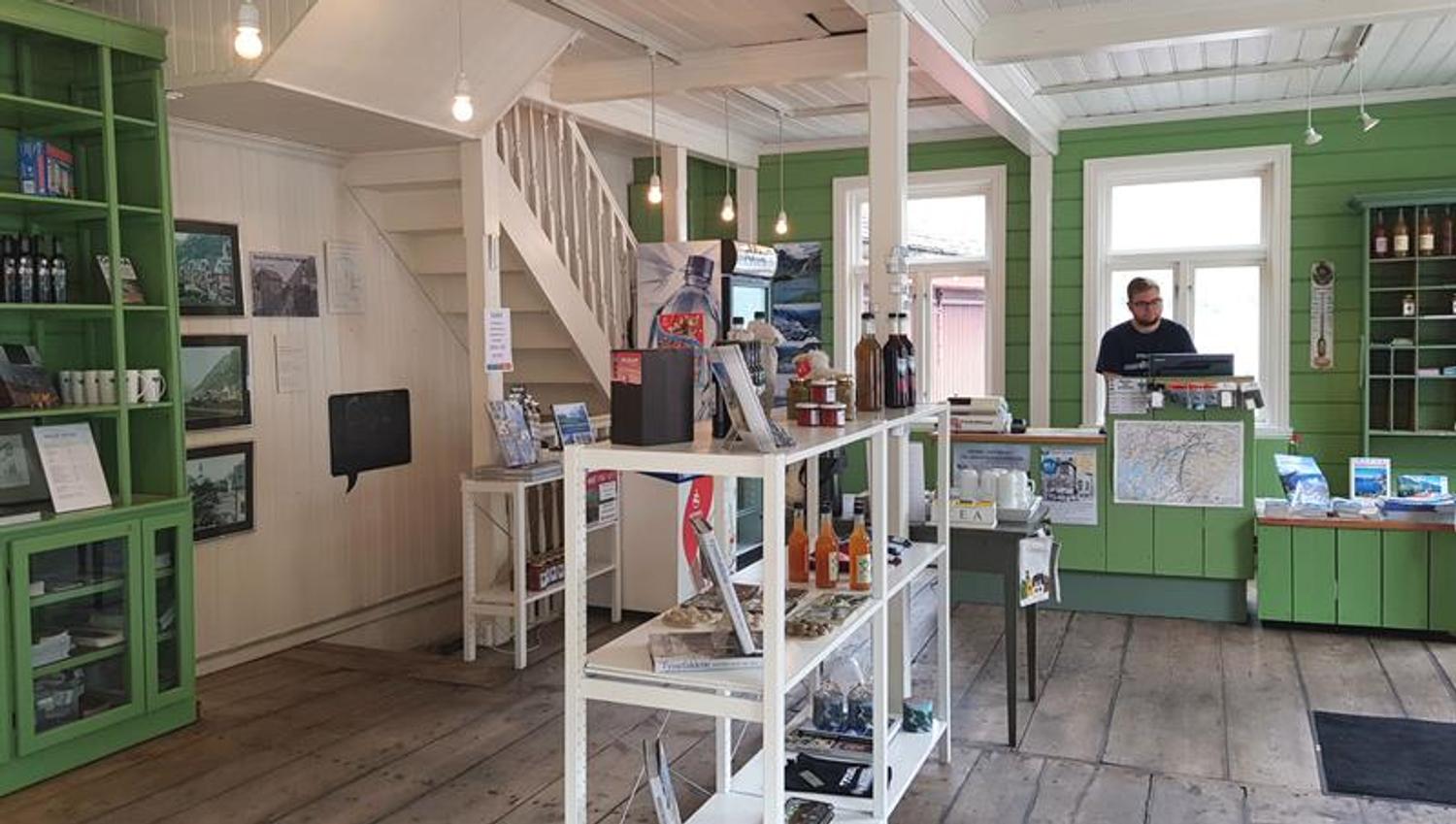 Entrance area of the souvenir shop at the Kraftmuseet, where visitors can purchase local products and informational materials.