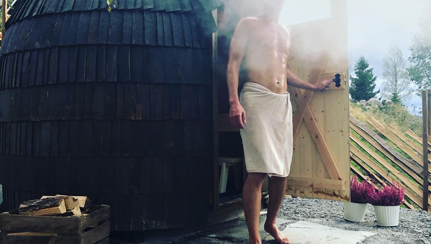 man infront of a sauna
