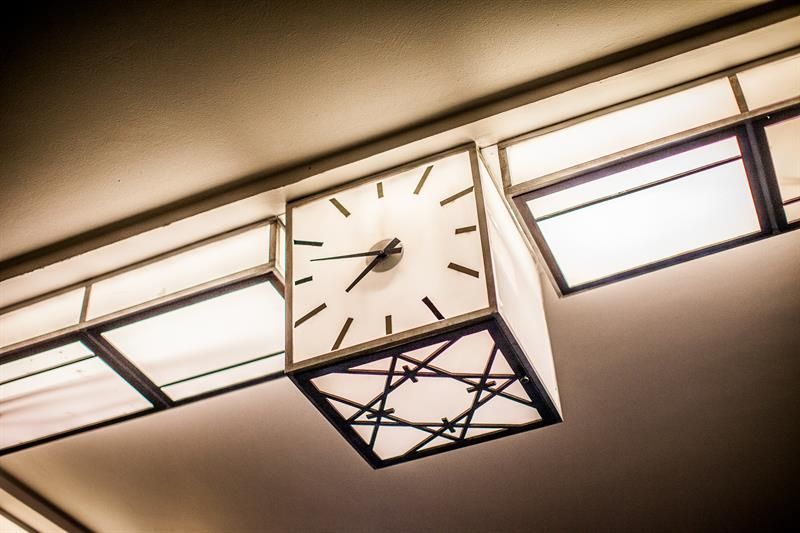 Square light clock in the ceiling, art deco style