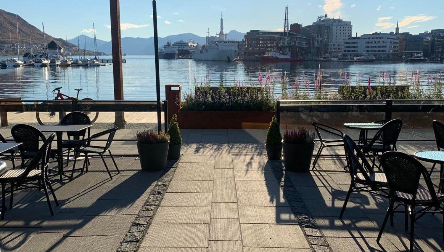 Outdoor seatings outside the wine bar with a view