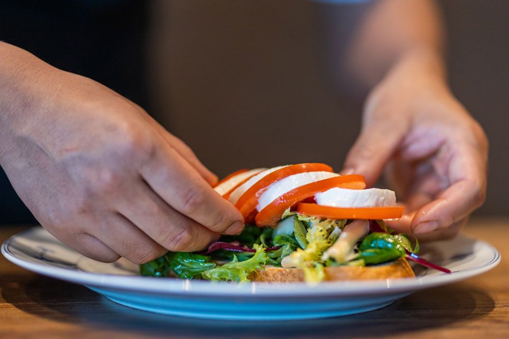 chef makes sandwiches at Jonas B Gundersen in Porsgrunn
