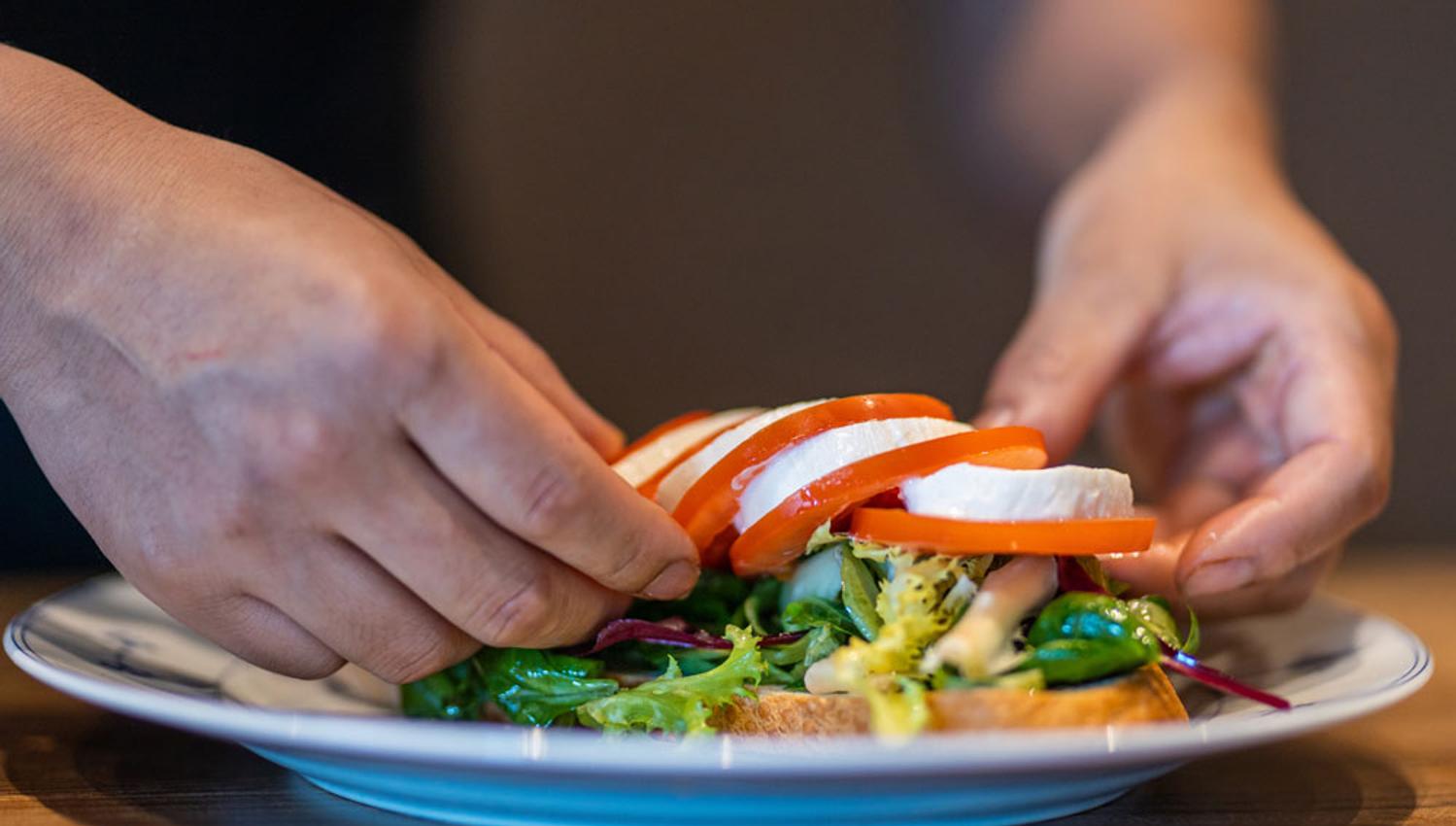 chef makes sandwiches at Jonas B Gundersen in Porsgrunn