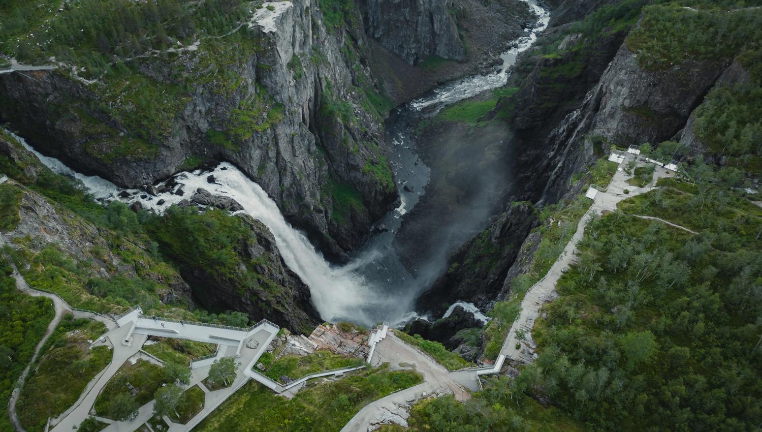 A drone photo of the viewing platforms surrounding the Vøringsfossen waterfall.