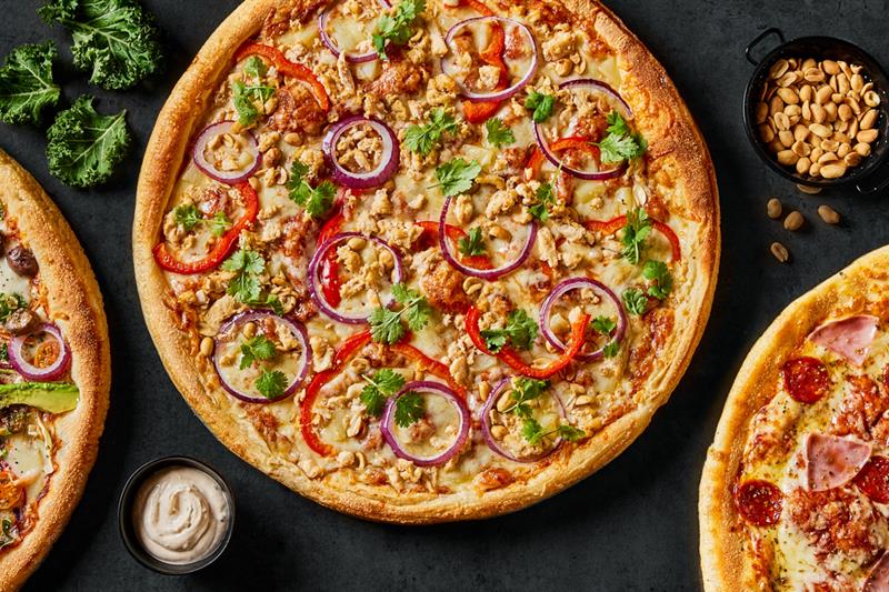 Detaljbilde av pizzaer.