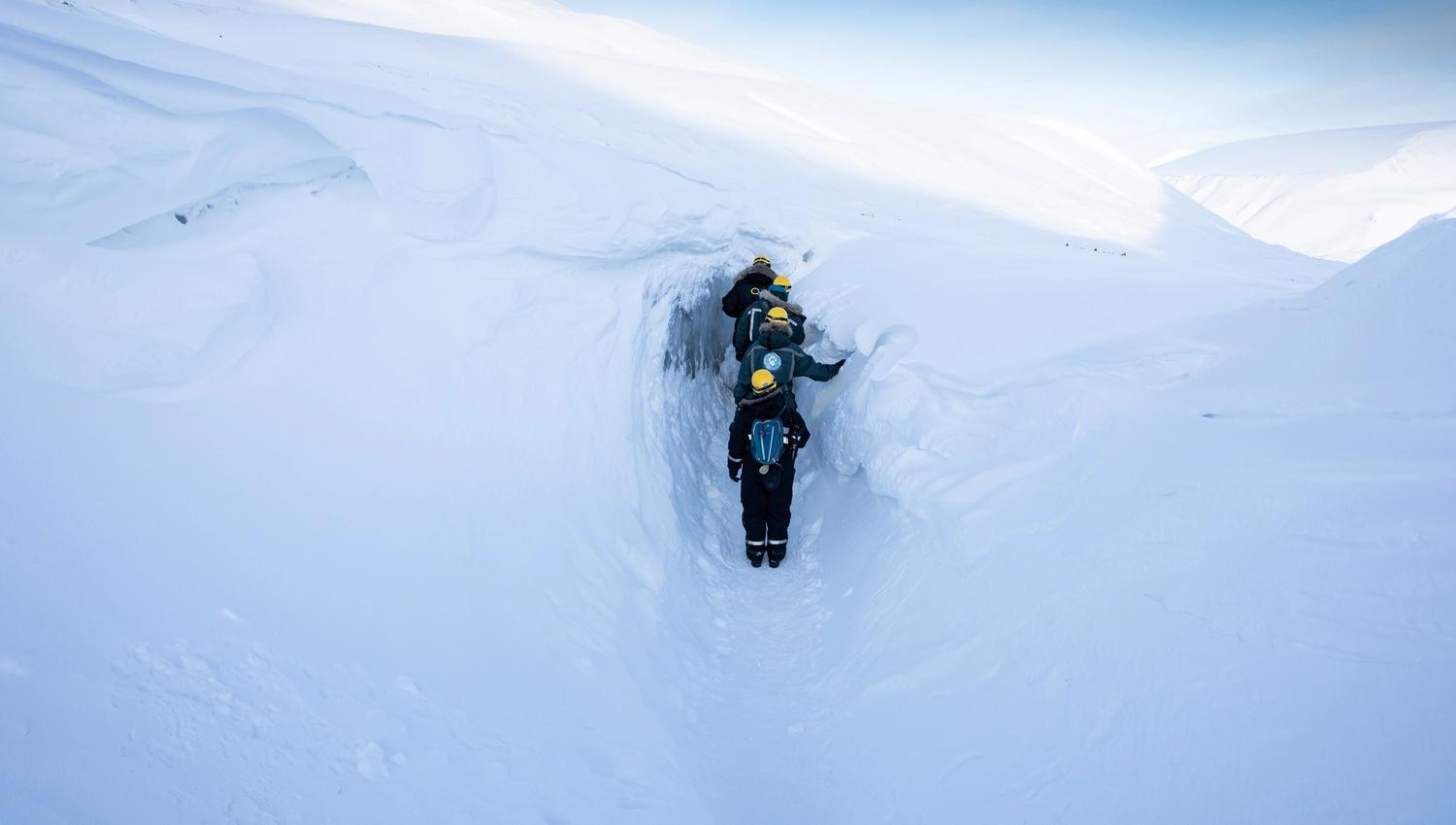 Persons entering the ice cave