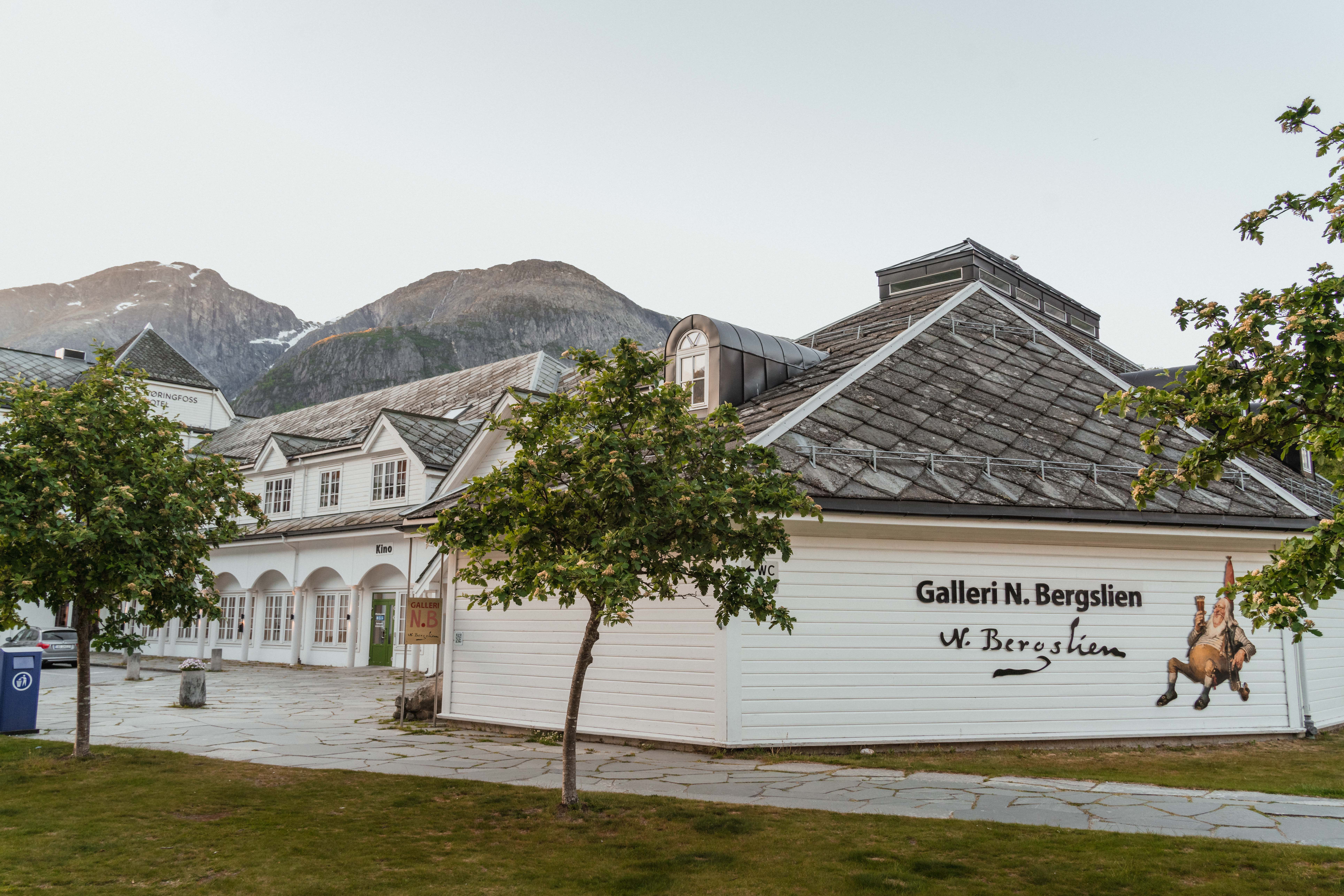 A white wooden building showing the sign "Gallery N. Bergslien"