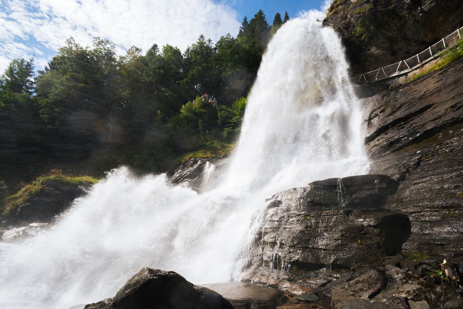 Close-up of Steinsdalsfossen, where the water cascades down the mountainside.