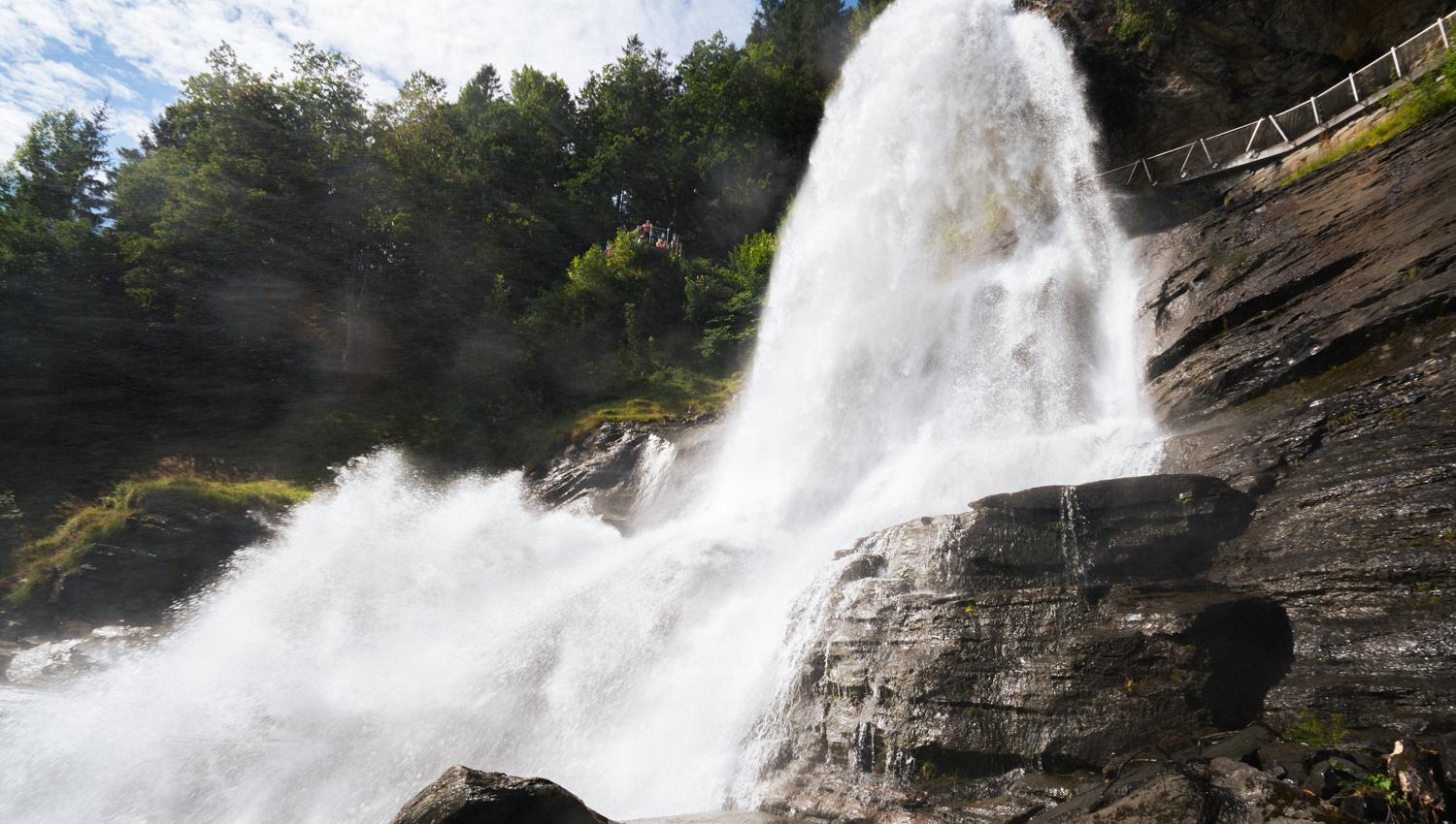 Close-up of Steinsdalsfossen, where the water cascades down the mountainside.