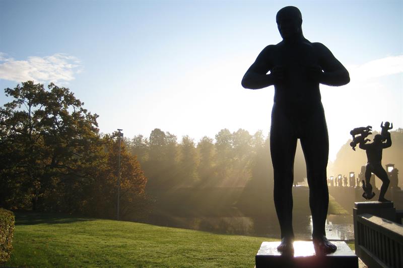 Statue of man in morning light.