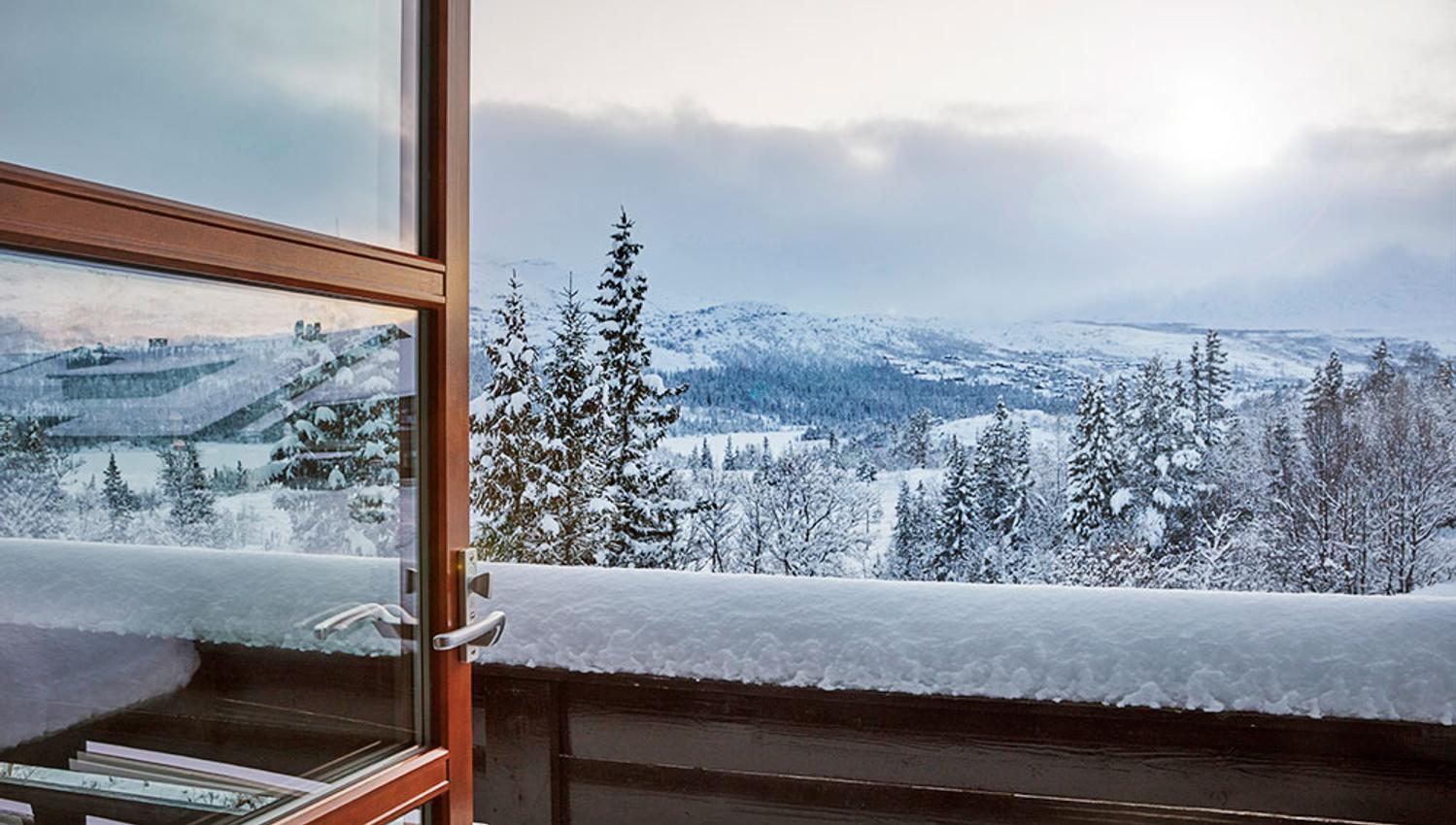 view from the balcony of the 2-room apartment at Gaustablikk apartments in winter