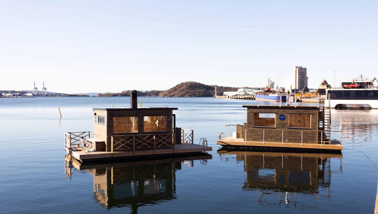 Two floating saunas in the fjord.
