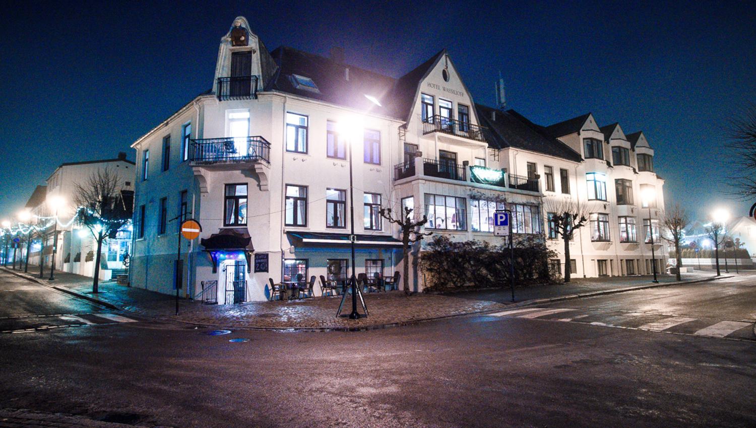 The facade of the hotel in the evening